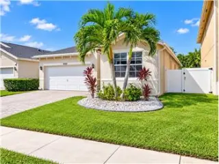 Propiedad de alquiler con 4 dormitorios y 2 baños en LAKE WORTH BEACH
