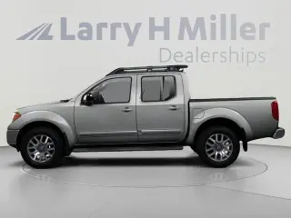 Nissan Frontier 2010 4x4 SE V6 4dr Crew Cab SWB Pickup 6M