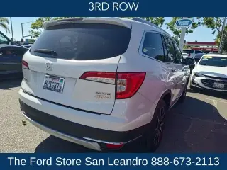 Honda Pilot 2020 AWD Touring 4dr SUV w/Rear Captain's Chairs