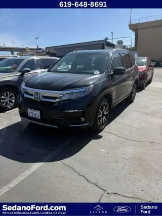 Honda Pilot 2022 Touring 4dr SUV w/Rear Captain's Chairs
