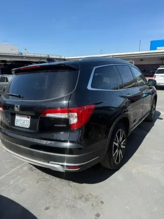 Honda Pilot 2022 Touring 4dr SUV w/Rear Captain's Chairs