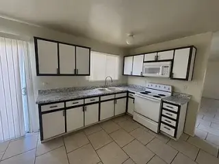 Recently painted and upgraded tile throughout main areas of home.