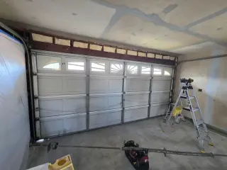 Pre owned Sectional roll up two car garage door