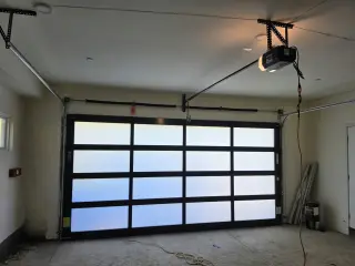 Full Glass View Sectional roll-up garage door Black on White