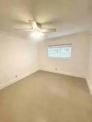 Freshly painted and ideally located just minutes from Mizner Park