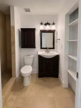 Freshly painted and ideally located just minutes from Mizner Park