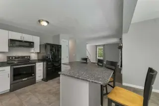 Inviting Cul-de-Sac Home with Granite Kitchen and Farmer’s Porch