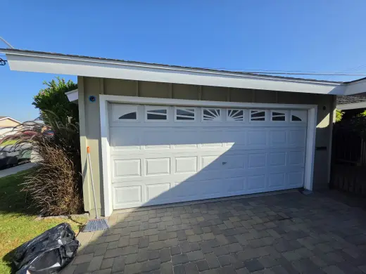 Pre owned Sectional roll up two car garage door