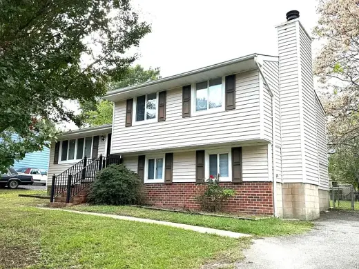 Spacious single-family home with three distinct living areas.