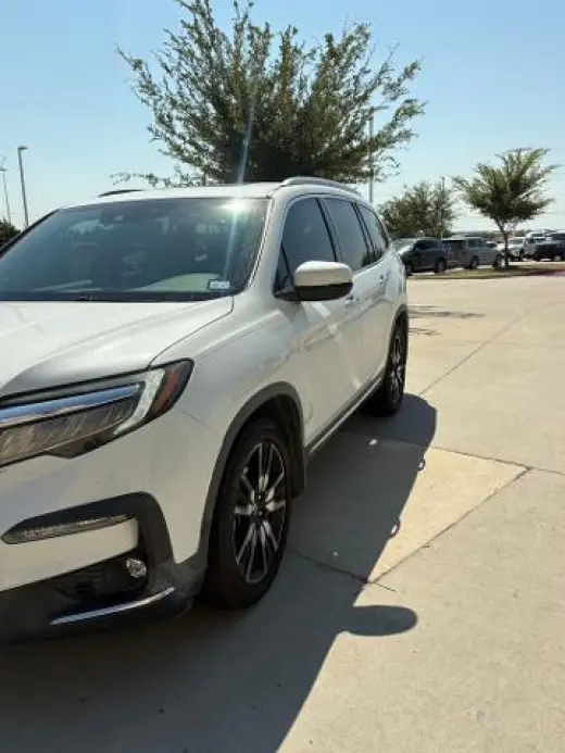 Honda Pilot 2021 Touring SUV 4 puertas con asientos traseros tipo capitán