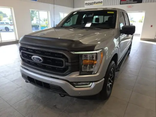 Ford F-150 2022 4x4 XLT 4p SuperCrew 5.5 ft. SB plateada metálica CARFAX de un solo propietario. 19/24 MPG ciudad/carretera 2022 Ford F-150 XLT 4WD 10 velocidades automática 2.7L V6 EcoBoost 4WD.¡PRECIOS AL POR MAYOR PARA TODOS! Inspección de segu