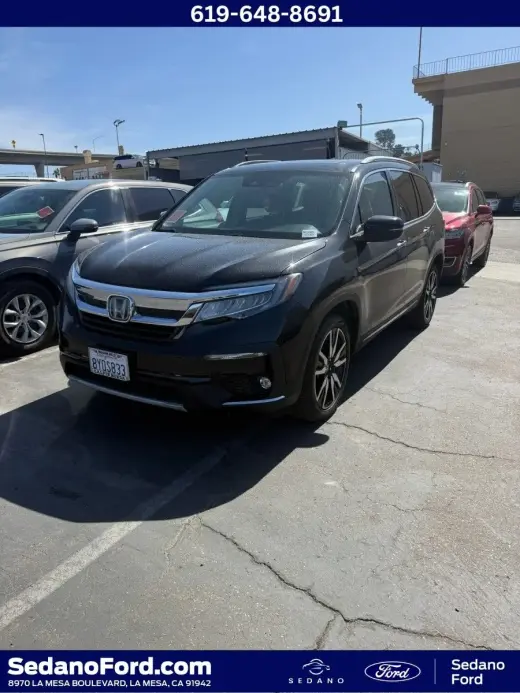 Honda Pilot 2022 Touring 4dr SUV w/Rear Captain's Chairs