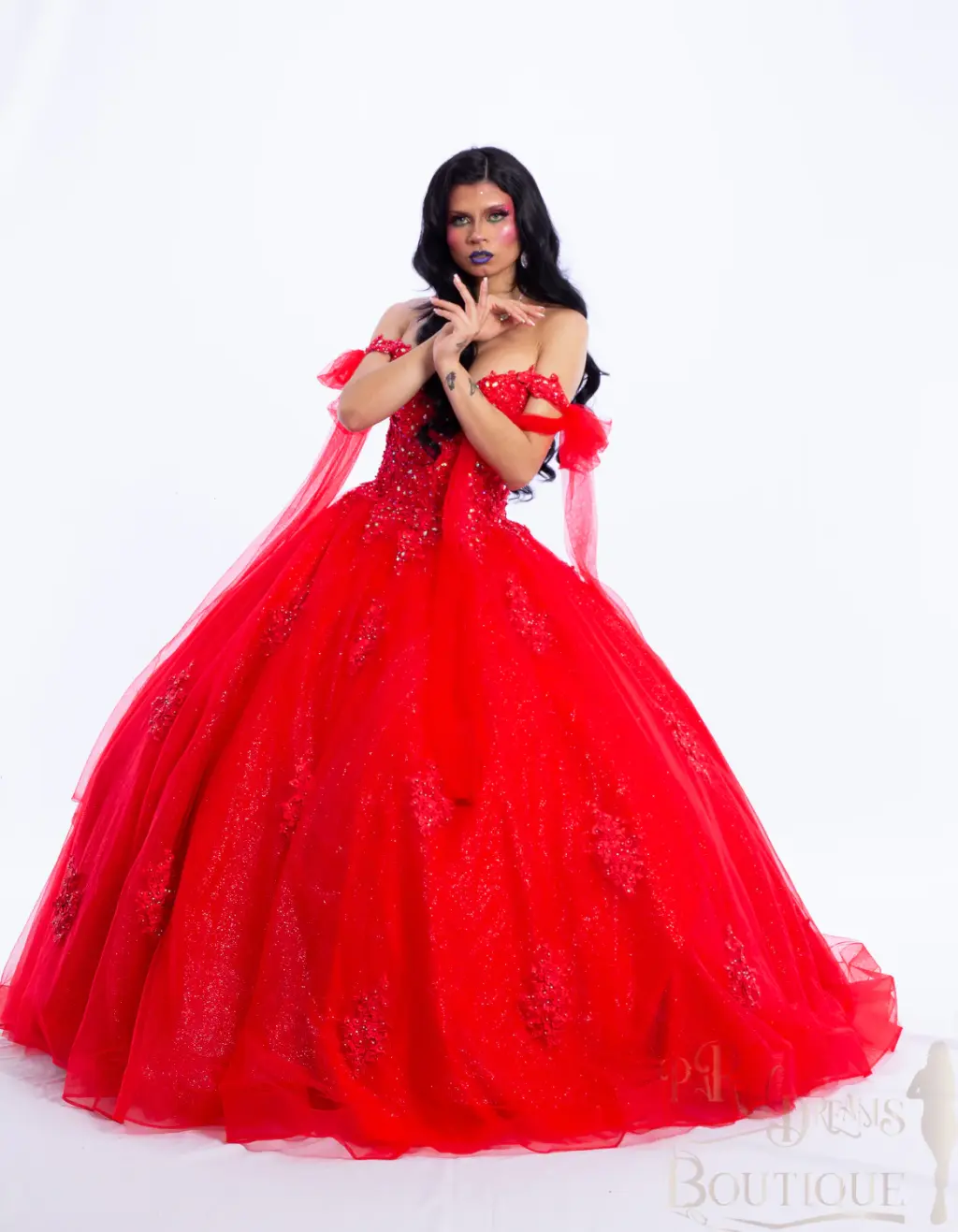 A red Barbieland quinceañera dress with off-the-shoulder neckline, sheer puff sleeves, beaded bodice, and voluminous sparkling ball gown skirt -1