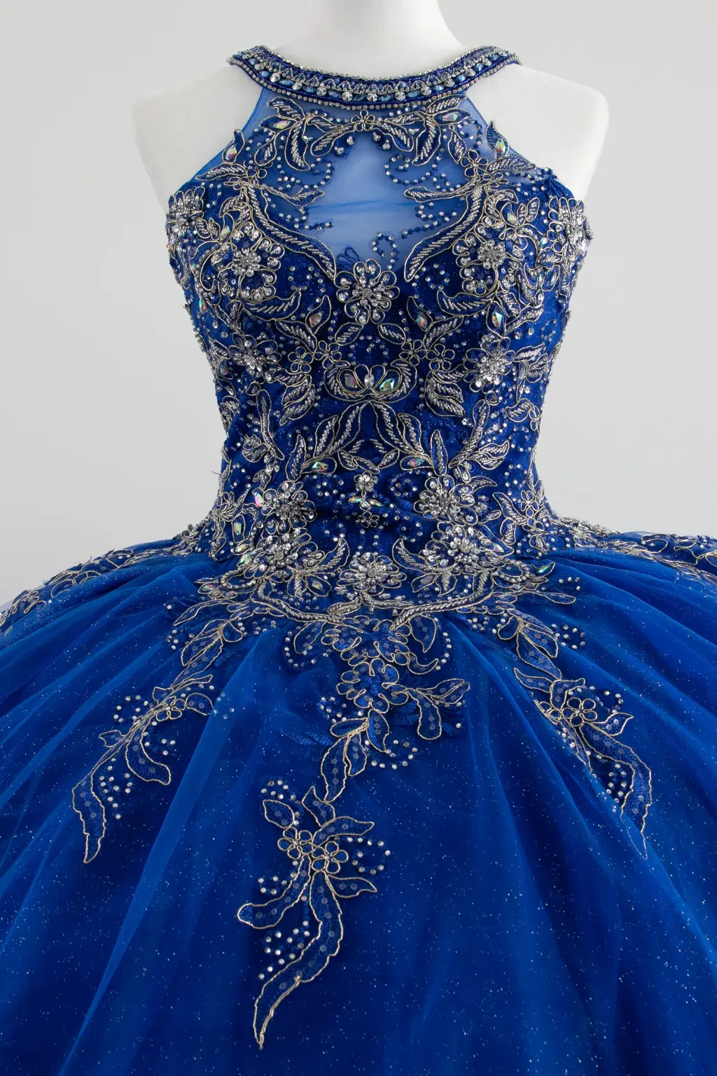 Royal blue quinceañera dress with silver embellishments, high neckline, lace-up back, and voluminous ball gown skirt -1