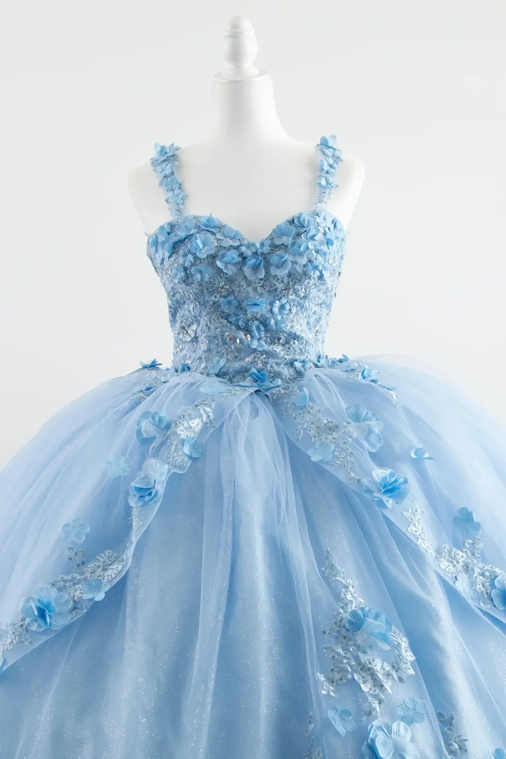 Light blue quinceañera dress with floral appliqués, sweetheart neckline, and voluminous ball gown skirt -1