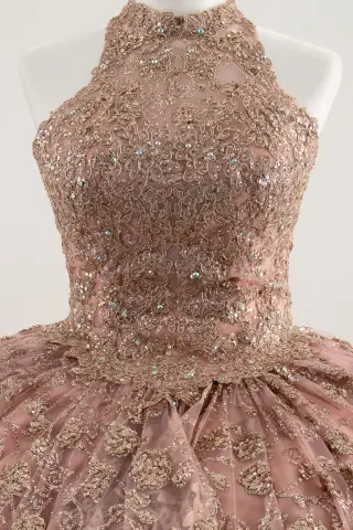 Blush pink sleeveless quinceañera dress with lace appliqués and a voluminous ball gown skirt -1