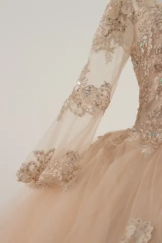 Long-sleeve peach/cream quinceañera dress with lace appliqués, sweetheart neckline, and voluminous ball gown skirt -3