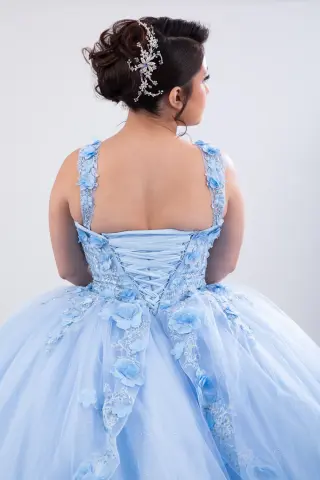 Light blue quinceañera dress with floral appliqués, sweetheart neckline, and voluminous ball gown skirt -5