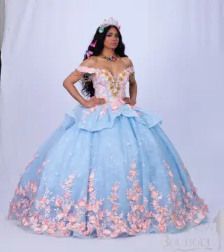 A blue quinceañera dress with pink floral appliqués, butterfly accents, and an off-the-shoulder neckline, featuring a voluminous skirt -1
