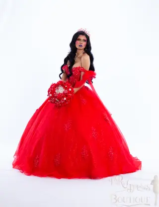 A red Barbieland quinceañera dress with off-the-shoulder neckline, sheer puff sleeves, beaded bodice, and voluminous sparkling ball gown skirt -5